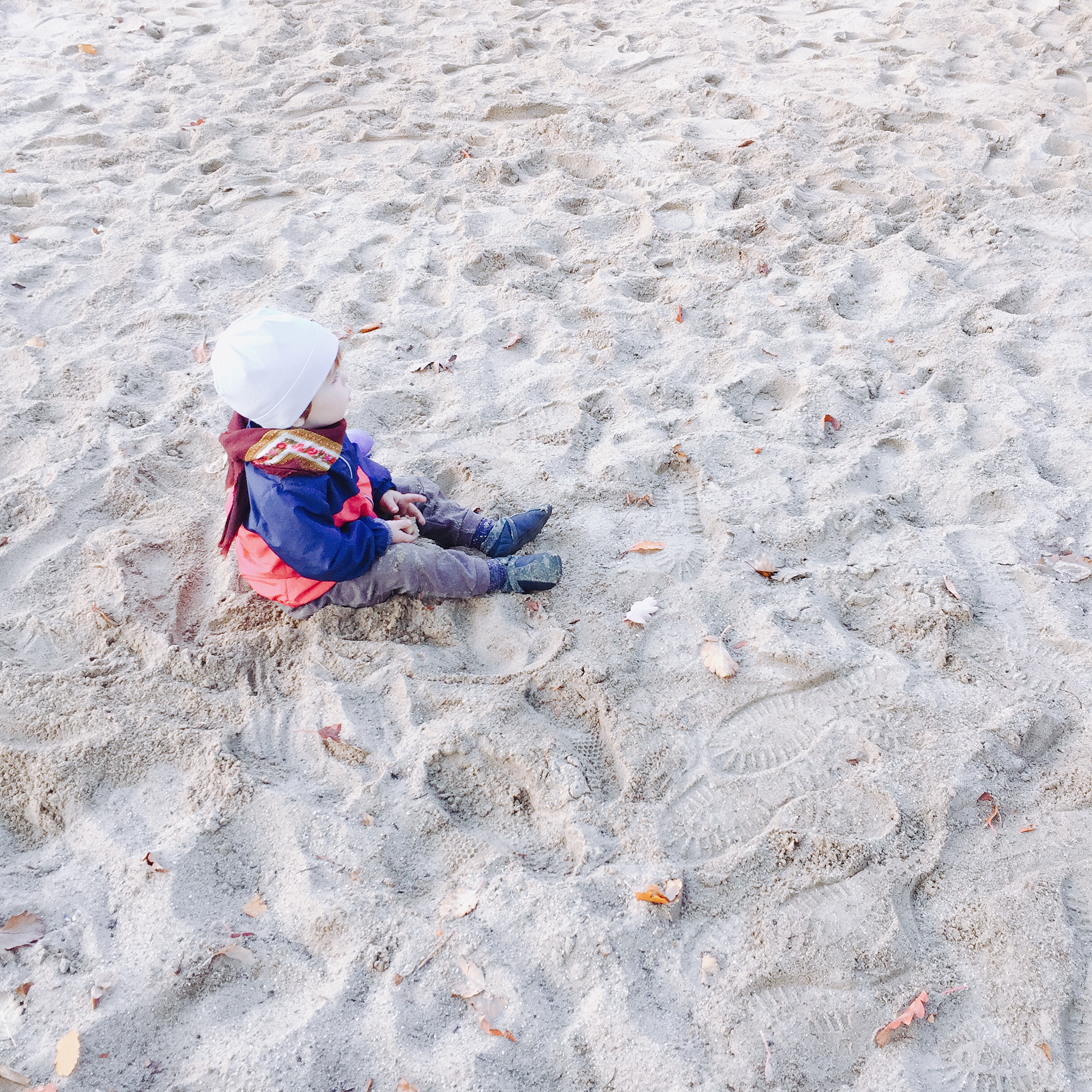 Kind im Sand
